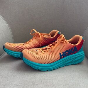 Hoka Orange and Teal Athletic Shoes